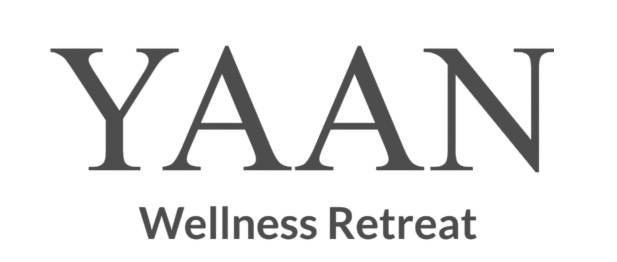 Logo for "Yaan Wellness Retreat" with the word "Yaan" in bold, uppercase letters and "Wellness Retreat" in smaller, uppercase letters beneath it.